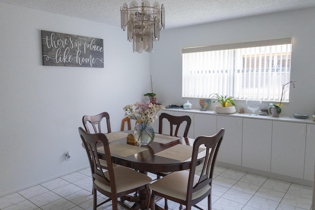 106 Lake Helen Dr, West Palm Beach, FL 33411 - dining space with a chandelier and a textured ceiling
