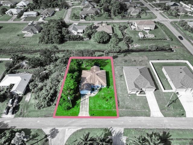 3990 Halcomb St, Port Saint Lucie, FL 34953 - aerial perspective of suburban area featuring property parcel outlined