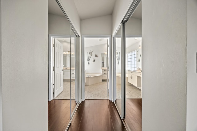 7116 Trentino Way, Boynton Beach, FL 33472 - corridor featuring wood-type flooring