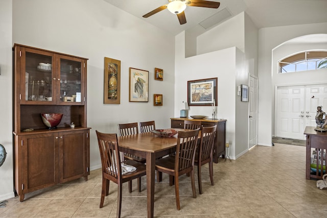 7116 Trentino Way, Boynton Beach, FL 33472 - dining room featuring high vaulted ceiling, a ceiling fan, light tile patterned floors, and baseboards