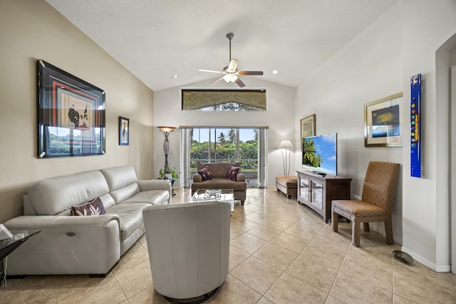 7116 Trentino Way, Boynton Beach, FL 33472 - living room featuring a ceiling fan, light tile patterned floors, high vaulted ceiling, and baseboards