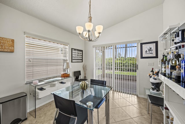7116 Trentino Way, Boynton Beach, FL 33472 - dining space featuring a chandelier, lofted ceiling, light tile patterned floors, and baseboards