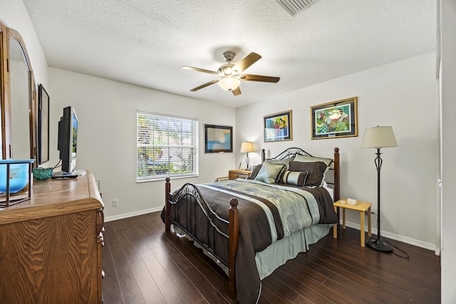 7116 Trentino Way, Boynton Beach, FL 33472 - bedroom with baseboards, wood finished floors, a textured ceiling, and ceiling fan