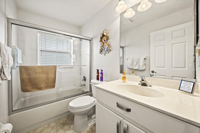 7116 Trentino Way, Boynton Beach, FL 33472 - bathroom with vanity, combined bath / shower with glass door, toilet, and tile patterned floors