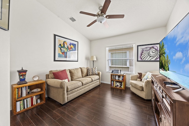 7116 Trentino Way, Boynton Beach, FL 33472 - living area featuring vaulted ceiling, ceiling fan, dark wood finished floors, a textured ceiling, and baseboards