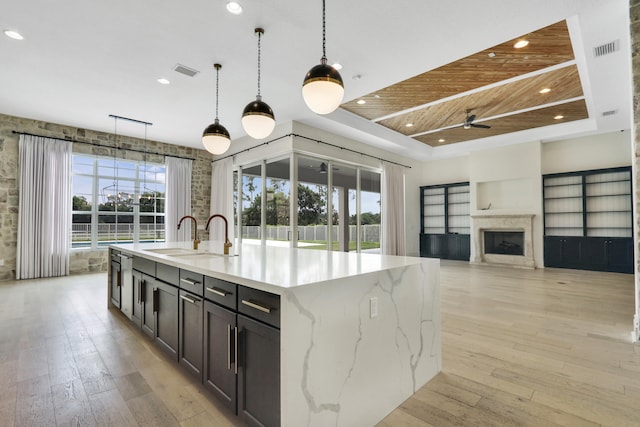 10032 Calabrese Trl, Jupiter, FL 33478 - kitchen with a sink, wood ceiling, recessed lighting, ceiling fan, and light wood-type flooring