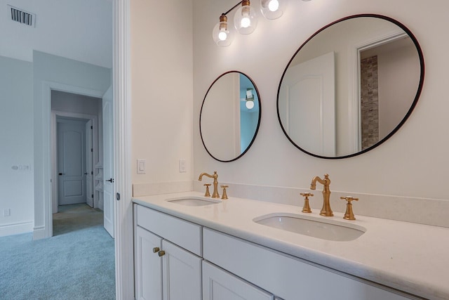 10032 Calabrese Trl, Jupiter, FL 33478 - bathroom featuring double vanity and baseboards