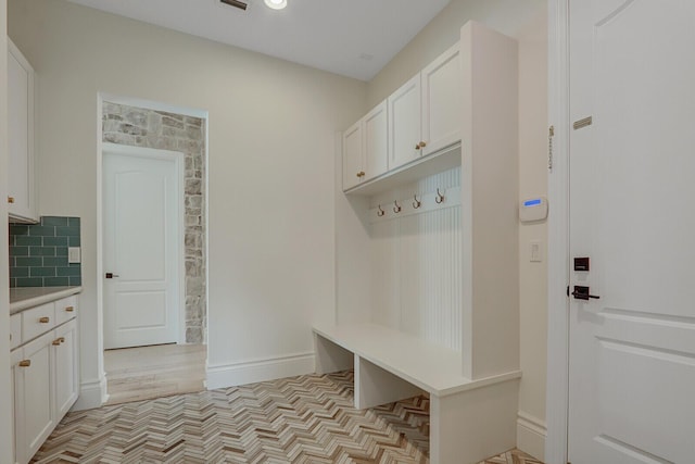 10032 Calabrese Trl, Jupiter, FL 33478 - mudroom with baseboards