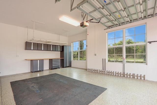 10032 Calabrese Trl, Jupiter, FL 33478 - garage featuring a garage door opener