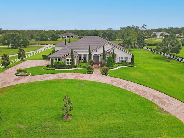 10032 Calabrese Trl, Jupiter, FL 33478 - view of front of property with curved driveway and a tiled roof