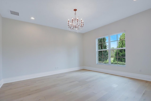 10032 Calabrese Trl, Jupiter, FL 33478 - unfurnished room featuring a chandelier, light wood-type flooring, baseboards, and recessed lighting