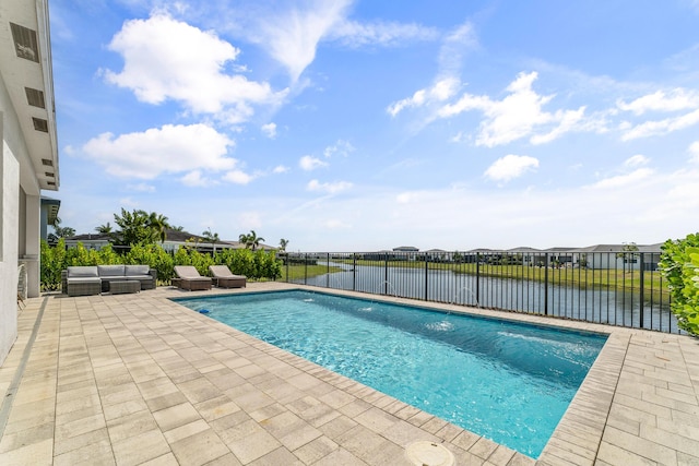 11244 SW Lyra Dr, Port Saint Lucie, FL 34987 - view of swimming pool with outdoor lounge area, a patio, and a water view