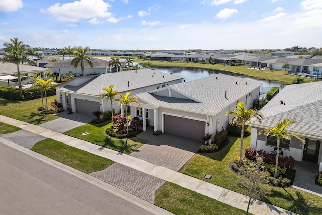 11244 SW Lyra Dr, Port Saint Lucie, FL 34987 - aerial view of residential area featuring a nearby body of water