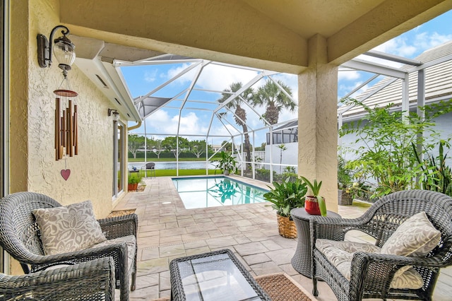 9278 Heathridge Dr, West Palm Beach, FL 33411 - swimming pool featuring a patio, a water view, and a lanai