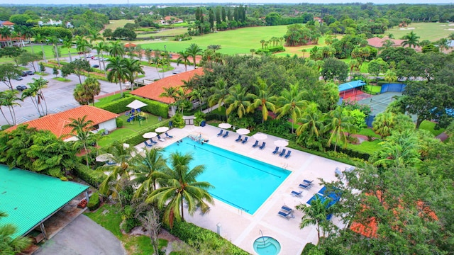 9278 Heathridge Dr, West Palm Beach, FL 33411 - aerial view of a pool, a golf club, and a tree filled landscape