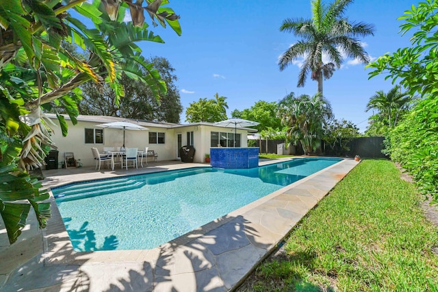4311 NE 16th Ave, Oakland Park, FL 33334 - view of pool featuring a fenced backyard and a patio