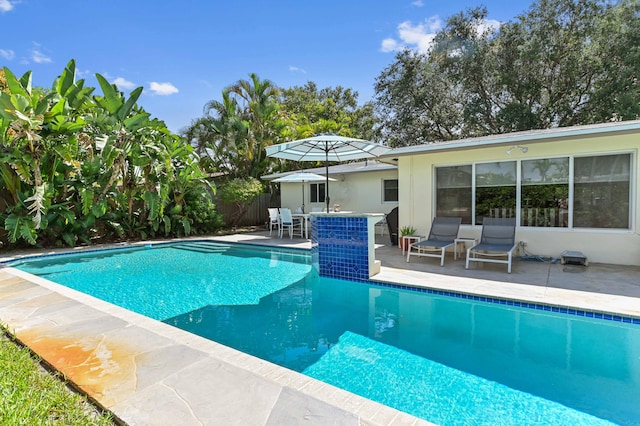 4311 NE 16th Ave, Oakland Park, FL 33334 - view of swimming pool with a patio area