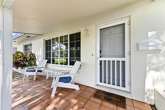 4311 NE 16th Ave, Oakland Park, FL 33334 - entrance to property with stucco siding and covered porch