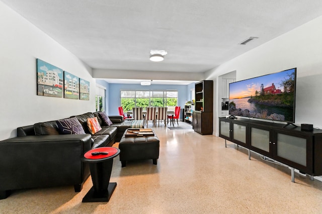 4311 NE 16th Ave, Oakland Park, FL 33334 - living area featuring dark aggregate flooring