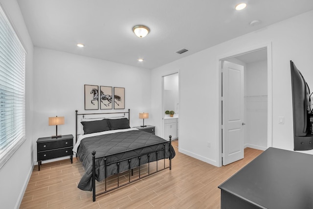 14517 Three Ponds Trl, Delray Beach, FL 33446 - bedroom with light wood-type flooring, multiple windows, baseboards, and recessed lighting