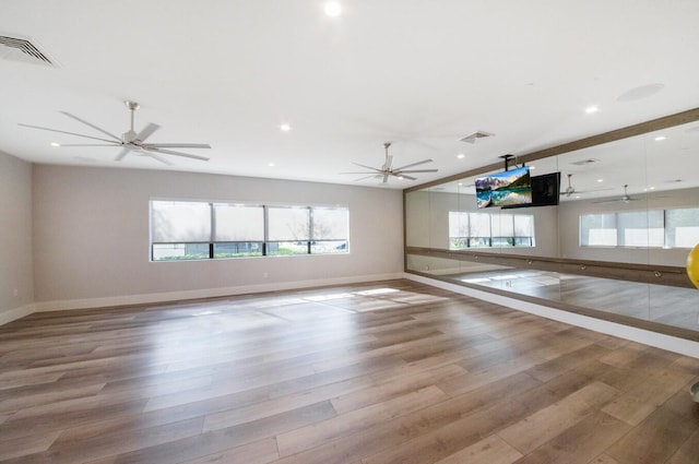14517 Three Ponds Trl, Delray Beach, FL 33446 - spare room with baseboards, wood finished floors, ceiling fan, and recessed lighting