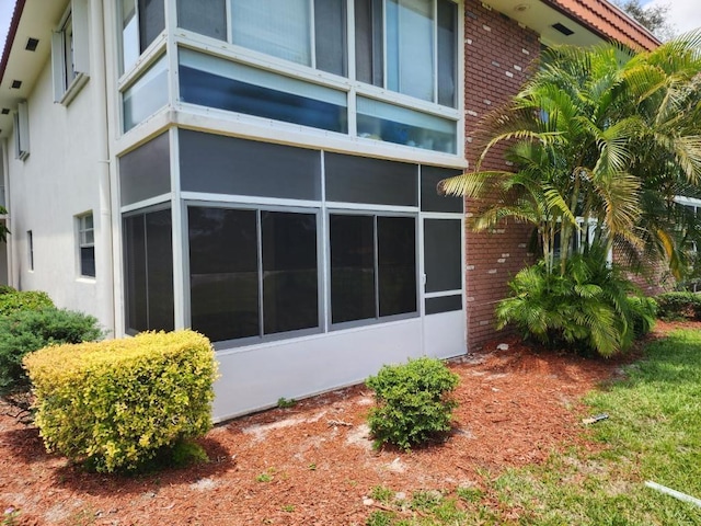 1225 NW 21st St NW Unit 15-1505, Stuart, FL 34994 - view of home's exterior featuring brick siding and stucco siding