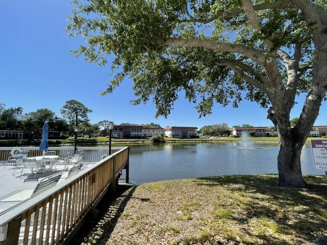 1225 NW 21st St NW Unit 15-1505, Stuart, FL 34994 - dock area featuring a water view