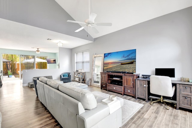 7989 Lakewood Cove Ct, Lake Worth, FL 33467 - living room featuring light wood-style flooring, ceiling fan, high vaulted ceiling, a desk, and baseboards