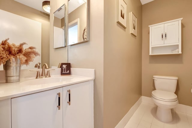 7989 Lakewood Cove Ct, Lake Worth, FL 33467 - half bathroom with toilet, vanity, baseboards, and tile patterned flooring