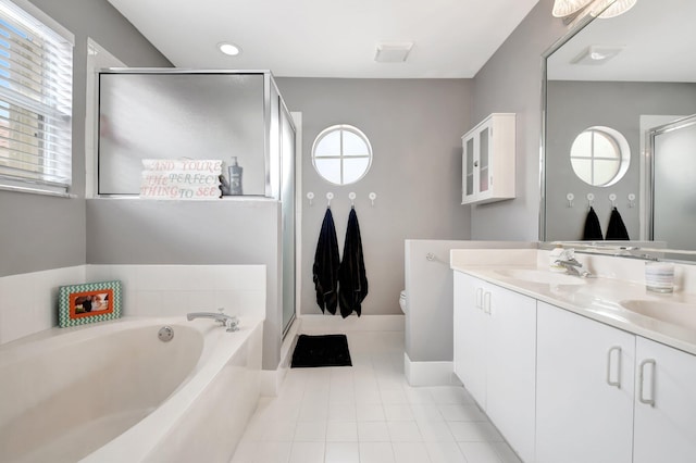 7989 Lakewood Cove Ct, Lake Worth, FL 33467 - full bath featuring a shower stall, double vanity, a bath, toilet, and tile patterned floors