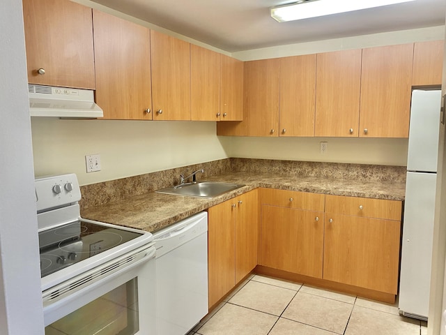 405 W Executive Center Dr Unit 208, West Palm Beach, FL 33401 - kitchen with under cabinet range hood, white appliances, a sink, and light tile patterned floors