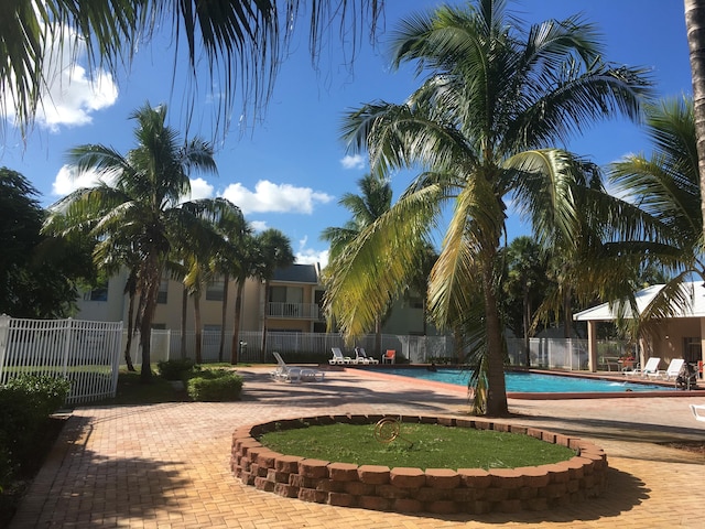 405 W Executive Center Dr Unit 208, West Palm Beach, FL 33401 - community pool featuring a patio area