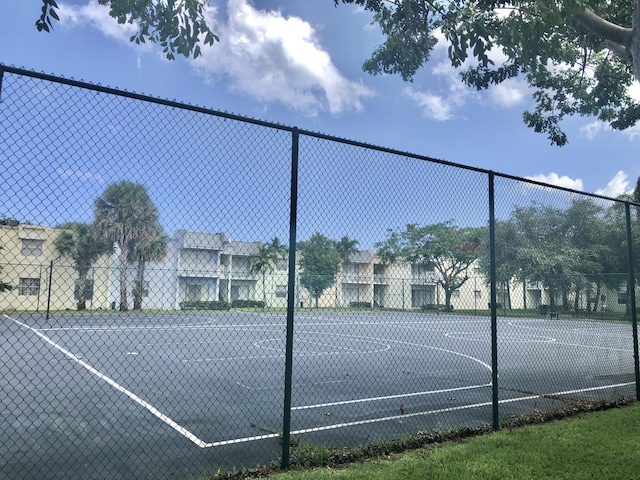 405 W Executive Center Dr Unit 208, West Palm Beach, FL 33401 - view of tennis court featuring community basketball court