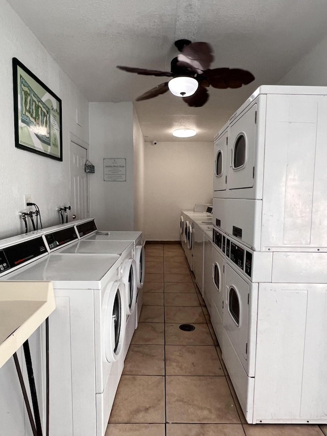 405 W Executive Center Dr Unit 208, West Palm Beach, FL 33401 - shared laundry room with separate washer and dryer, stacked washing machine and dryer, light tile patterned floors, and a ceiling fan