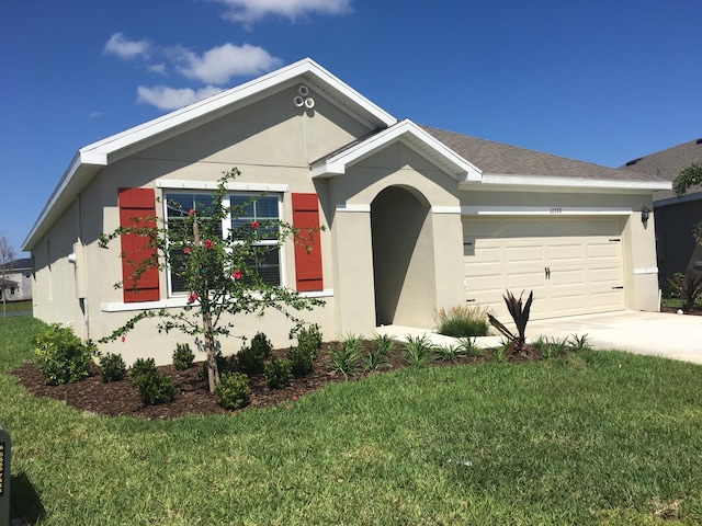 10789 SW Cremona Way, Port Saint Lucie, FL 34987 - ranch-style home with an attached garage, concrete driveway, a front lawn, and stucco siding