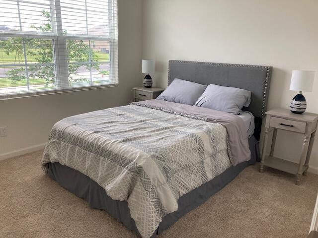 10789 SW Cremona Way, Port Saint Lucie, FL 34987 - bedroom with light colored carpet