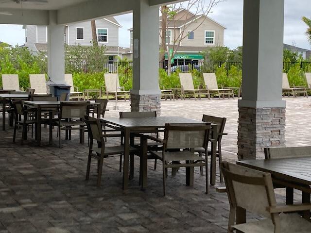10789 SW Cremona Way, Port Saint Lucie, FL 34987 - view of patio with outdoor dining space and a ceiling fan
