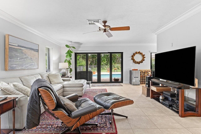 3523 Pine Haven Cir, Boca Raton, FL 33431 - living room with crown molding, light tile patterned floors, ceiling fan, a textured ceiling, and french doors