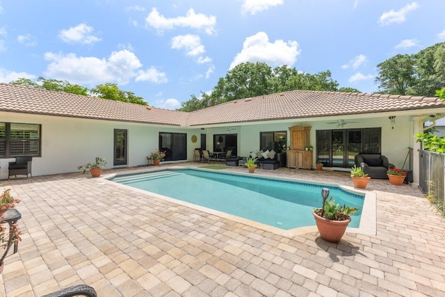 3523 Pine Haven Cir, Boca Raton, FL 33431 - outdoor pool featuring a ceiling fan, an outdoor living space, a patio, and french doors