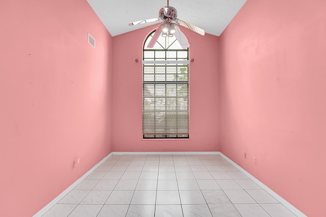 654 SW Kayak Ave, Port Saint Lucie, FL 34953 - spare room with a ceiling fan, vaulted ceiling, and baseboards