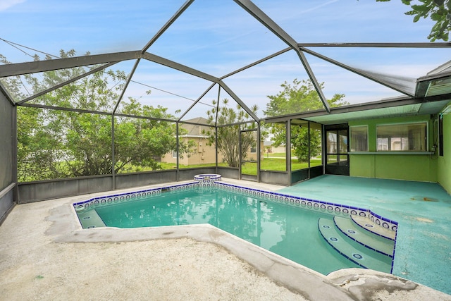 654 SW Kayak Ave, Port Saint Lucie, FL 34953 - outdoor pool with a patio and glass enclosure