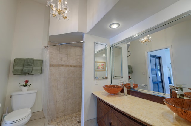 4290 Camrose Ln, West Palm Beach, FL 33417 - bathroom featuring a chandelier, vanity, a tile shower, and tile patterned floors
