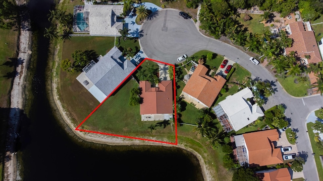 4290 Camrose Ln, West Palm Beach, FL 33417 - aerial perspective of suburban area featuring property boundaries highlighted and a large body of water