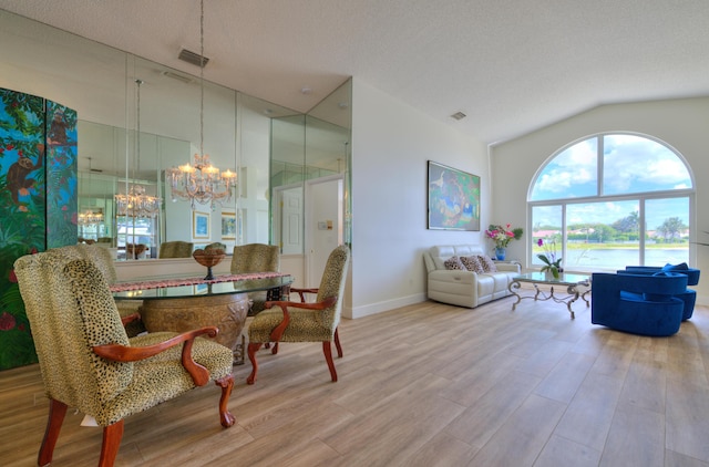 4290 Camrose Ln, West Palm Beach, FL 33417 - dining area featuring a chandelier, wood finished floors, and high vaulted ceiling