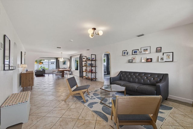 2476 S Florida Mango Rd, West Palm Beach, FL 33406 - living area with arched walkways and baseboards