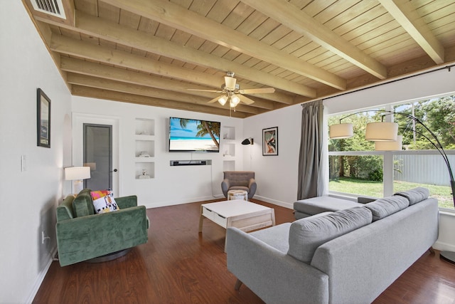 2476 S Florida Mango Rd, West Palm Beach, FL 33406 - living room featuring wooden ceiling with exposed beams, plenty of natural light, baseboards, built in shelves, and wood finished floors