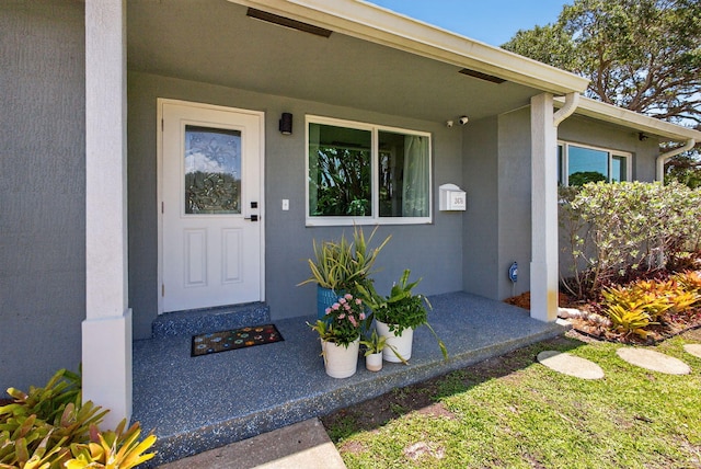 2476 S Florida Mango Rd, West Palm Beach, FL 33406 - entrance to property featuring stucco siding