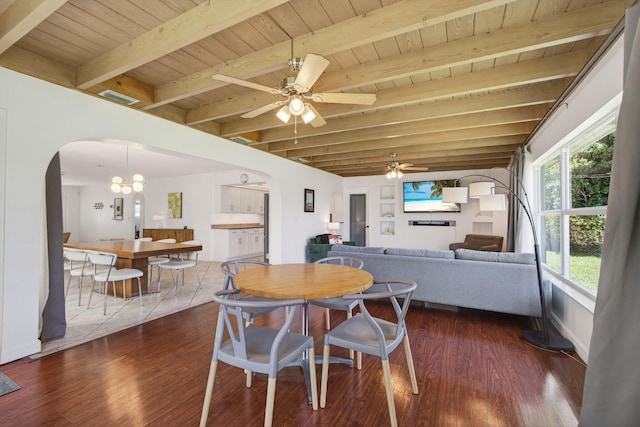 2476 S Florida Mango Rd, West Palm Beach, FL 33406 - dining room featuring arched walkways, wood ceiling with exposed beams, dark wood-style floors, ceiling fan, and a chandelier