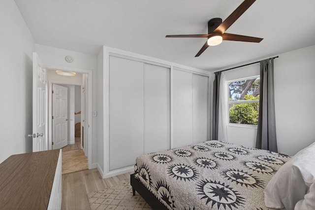 2476 S Florida Mango Rd, West Palm Beach, FL 33406 - bedroom featuring light wood-type flooring and a ceiling fan