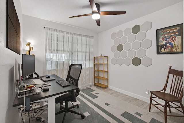 2476 S Florida Mango Rd, West Palm Beach, FL 33406 - home office with ceiling fan, light wood-style floors, and baseboards